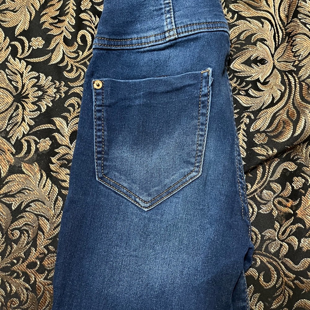 Blue ash  stretch jeans like new and looking for a good home